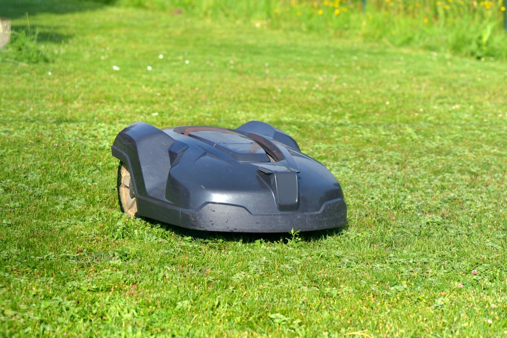 how does a robotic lawn mower work