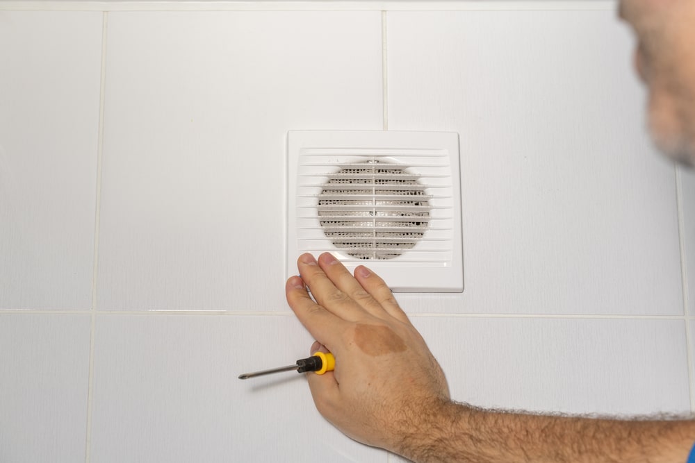 how to install an extractor fan through the wall