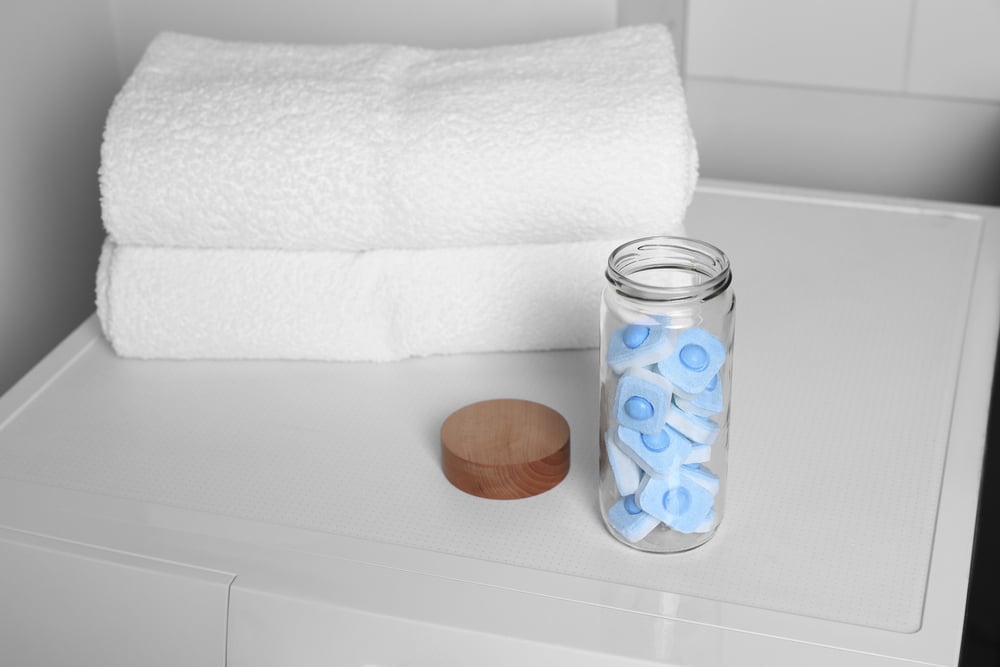 towels and a jar of tablets